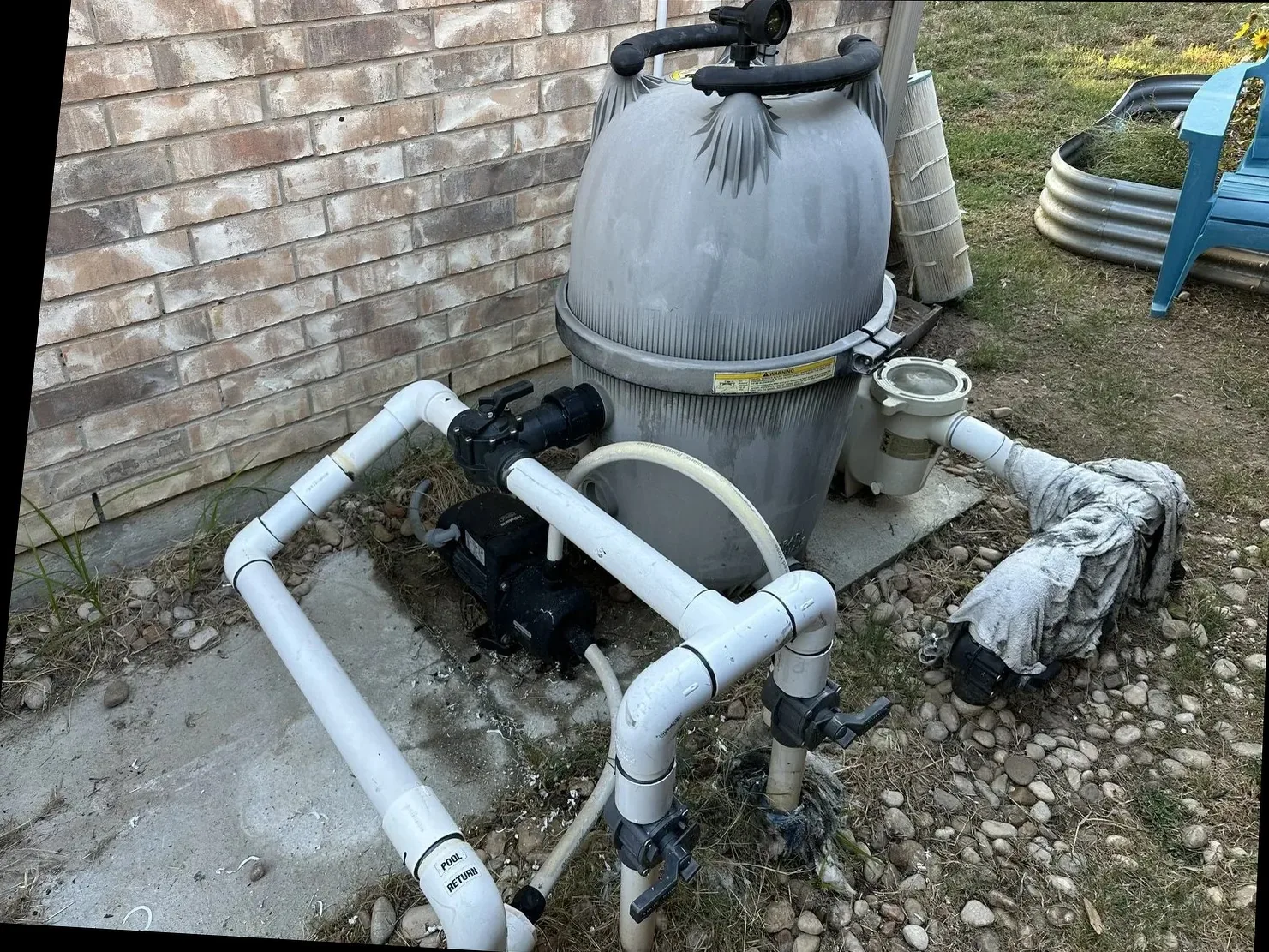 Pool equipment after a pressure leak repair, with the filter cartridges back in the tank